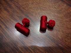 gemelli in passamaneria modello travetta rosso