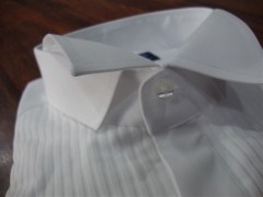 camicia frac con sparato plissettato e abbottonatura coperta